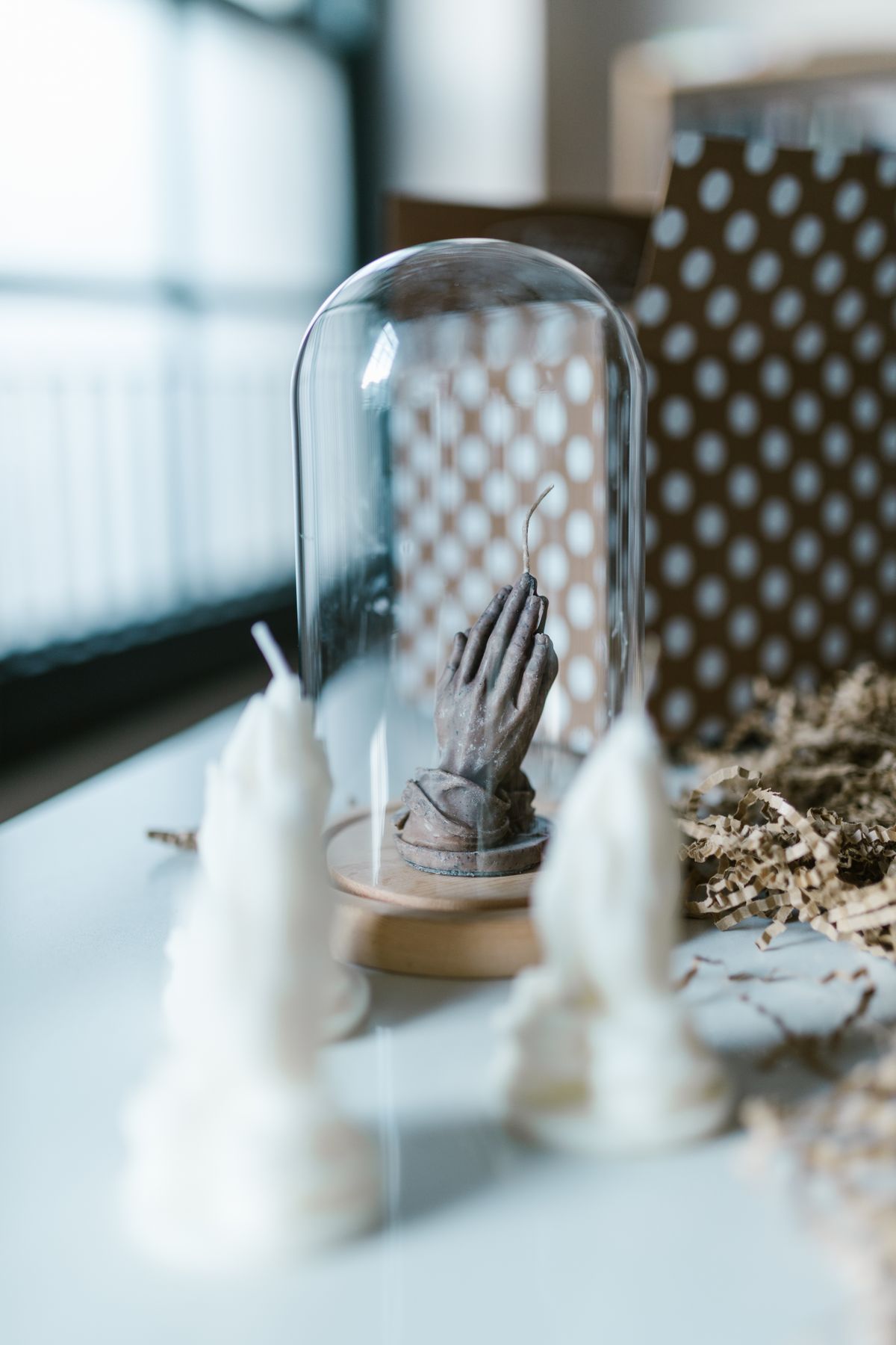 Sculpture Displayed Under Glass
